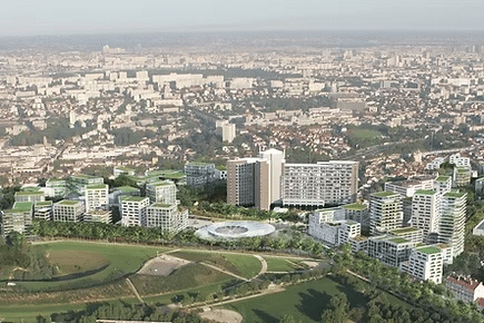 Vue aérienne d'un complexe résidentiel moderne intégré à un grand parc.